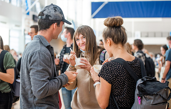 BYUI students and faculty gather by the I-Center after devotional and eat Reed's dairy ice cream to celebrate spirit week.