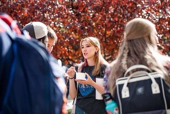 BYUI students and faculty gather by the I-Center after devotional and eat Reed's dairy ice cream to celebrate spirit week.