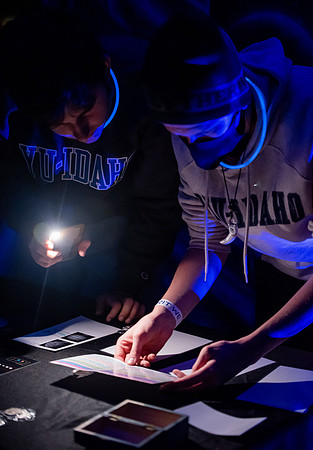 BYUI students play games and participate in activities at Glow Night for Spirit week on friday.