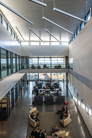 Students studying in the lobby of the Science and Technology Center.