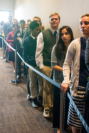 Students wait in line to shake hands with Elder Dallin H. Oaks, Quorum of the Twelve Apostles. Photo by Ryan Chase