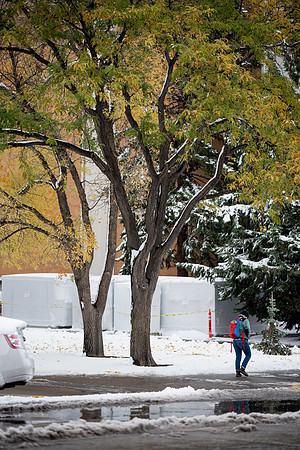 Students around campus before devotional after the first snowfall of the season during the fall 2021 semester.