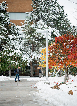 Students around campus before devotional after the first snowfall of the season during the fall 2021 semester.