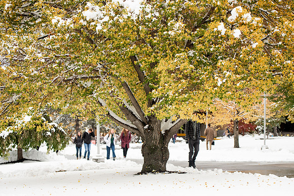 Students around campus before devotional after the first snowfall of the season during the fall 2021 semester.