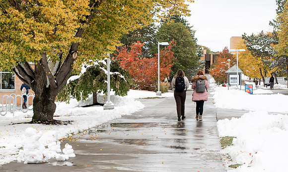 Students around campus after devotional after the first snowfall of the season during the fall 2021 semester.