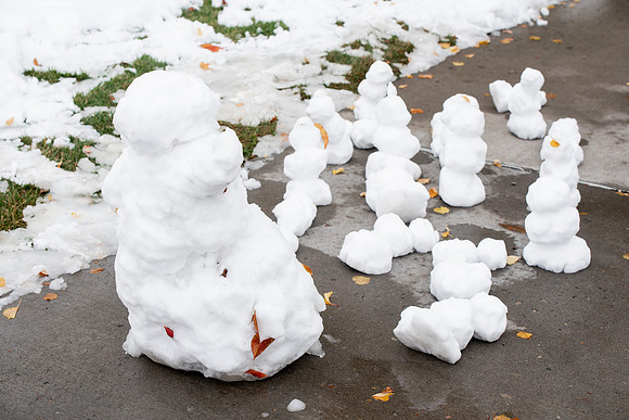 Students around campus after devotional after the first snowfall of the season during the fall 2021 semester.