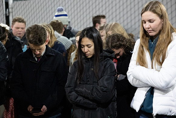 BYU-Idaho students participate in singing hymns under the stadium.