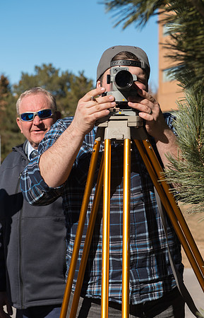 Department of Design and Construction Management students learning the fine art of surveying. Taught by Kim Leavitt