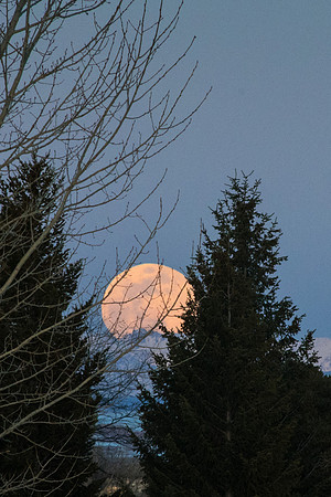 The third Supermoon of the year rising over the mountain tops. March 2019