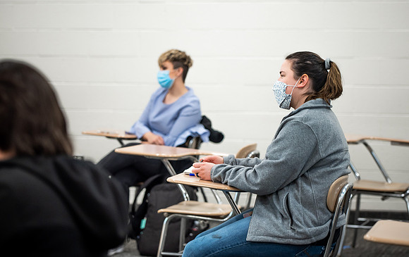 BYUI classes in the religion department meeting during Covid-19 with masks and social distanced seating.