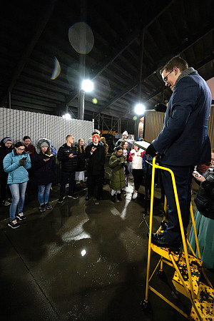 Students gather under the BYU-I Stadium to sing hymns.
