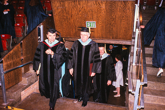 Elder Ballard and President Bennion entering Hart auditorium