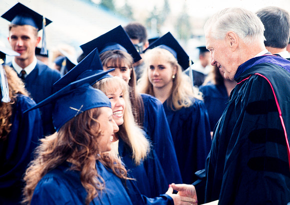 President Faust greets graduates