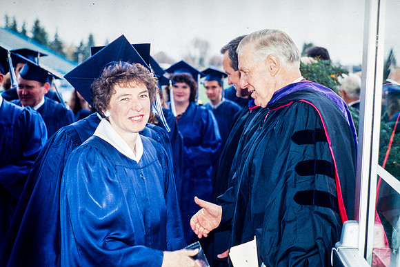 President Faust greets graduates
