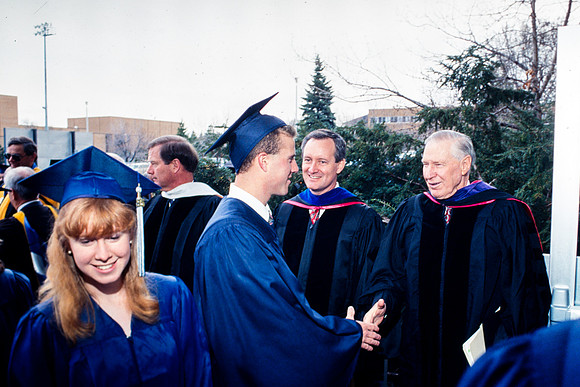 President Faust greets graduates