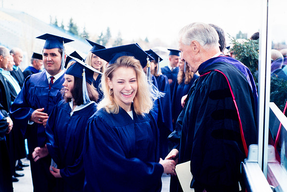 President Faust greets graduates