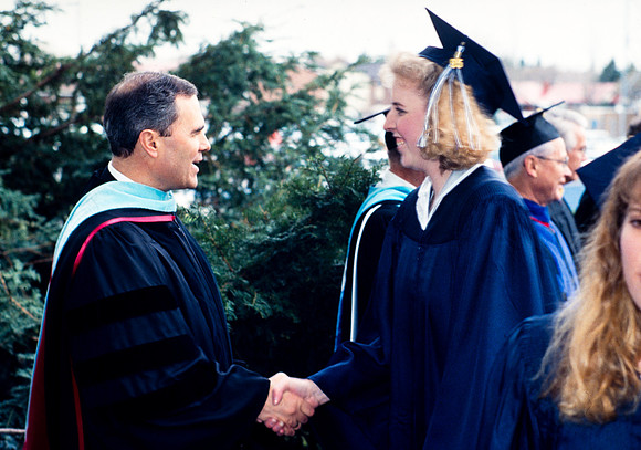 President Bennion greets graduates
