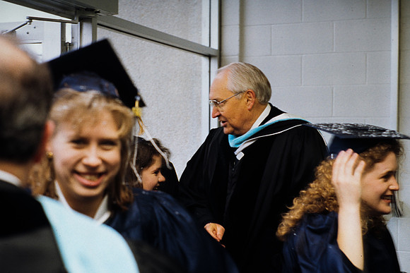 Elder Perry greeting students