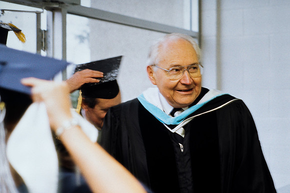 Elder Perry greeting students