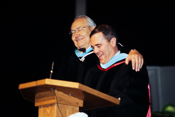 President Bennion and Elder Perry at the podium