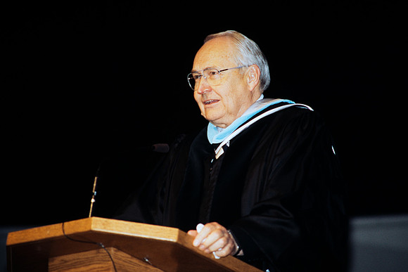 Elder Perry at the podium