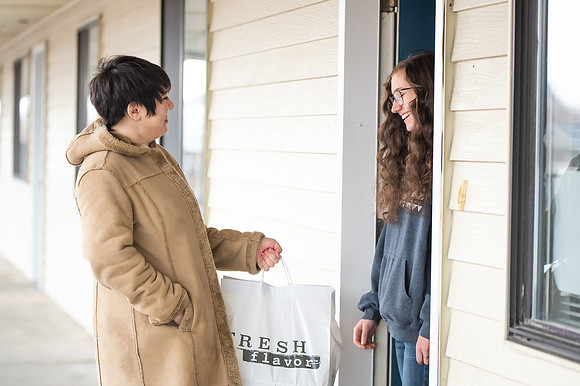 Students and staff distribute meals for students of BYUI for the University-wide break the fast event.