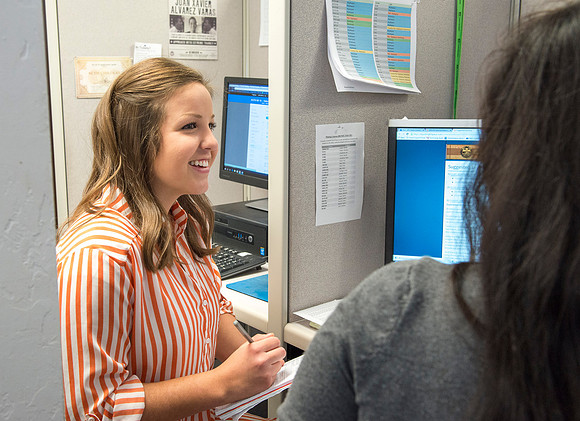 Student employees working together in Course Improvement.
