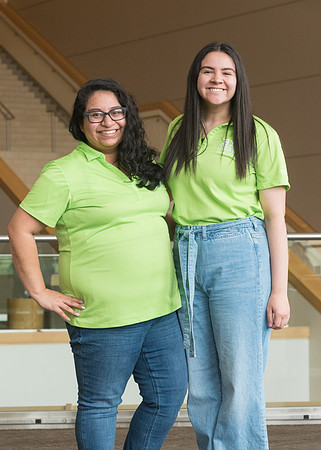 Group photos in the BYU-Idaho Center for the various student support teams.