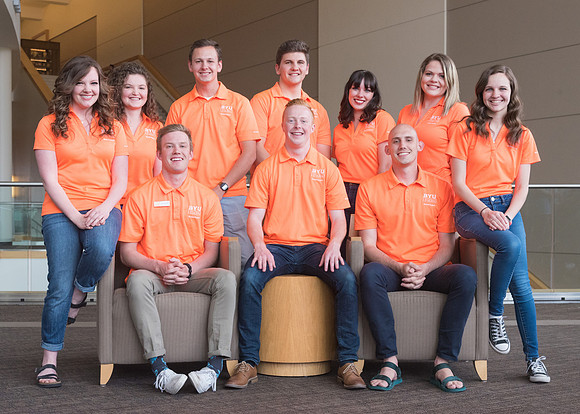 Group photos in the BYU-Idaho Center for the various student support teams.