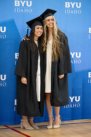 BYU-Idaho graduates gather in the I-Center to hear from Elder Carlos A. Godoy of the Seventy as he speaks at commencement.