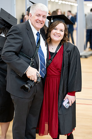 BYU-Idaho graduates gather in the I-Center to hear from Elder Carlos A. Godoy of the Seventy as he speaks at commencement.