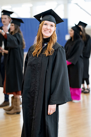 BYU-Idaho graduates gather in the I-Center to hear from Elder Carlos A. Godoy of the Seventy as he speaks at commencement.