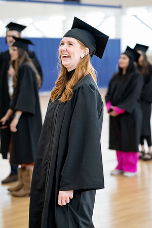 BYU-Idaho graduates gather in the I-Center to hear from Elder Carlos A. Godoy of the Seventy as he speaks at commencement.