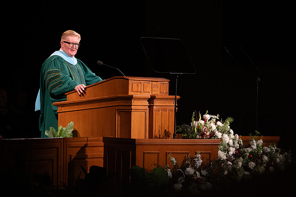 BYU-Idaho graduates gather in the I-Center. Brother R. Kelly Haws speaks.