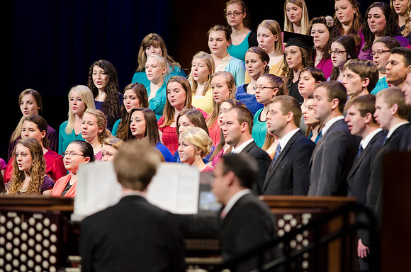 The BYU-I University Choir sings during the 2014 Winter Semester Graduation Commencement. Photo by Tyler Rickenbach