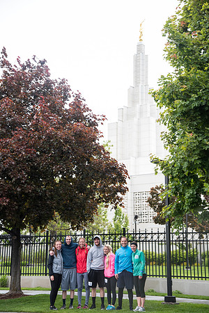 After braving the unpredictable Idaho weather in June, teams celebrate crossing the finish line near the Idaho Falls Temple in the annual temple to temple relay race.