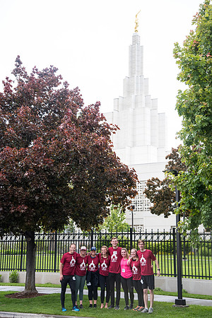 After braving the unpredictable Idaho weather in June, teams celebrate crossing the finish line near the Idaho Falls Temple in the annual temple to temple relay race.