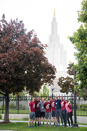 After braving the unpredictable Idaho weather in June, teams celebrate crossing the finish line near the Idaho Falls Temple in the annual temple to temple relay race.
