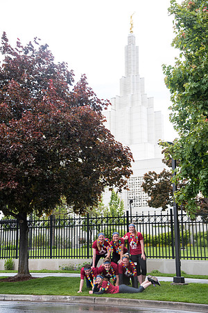 After braving the unpredictable Idaho weather in June, teams celebrate crossing the finish line near the Idaho Falls Temple in the annual temple to temple relay race.