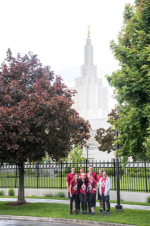 After braving the unpredictable Idaho weather in June, teams celebrate crossing the finish line near the Idaho Falls Temple in the annual temple to temple relay race.