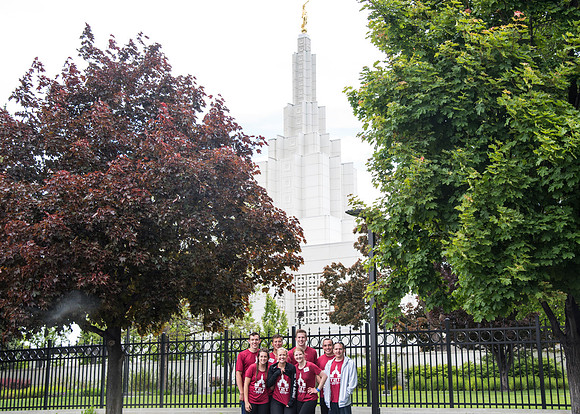 After braving the unpredictable Idaho weather in June, teams celebrate crossing the finish line near the Idaho Falls Temple in the annual temple to temple relay race.