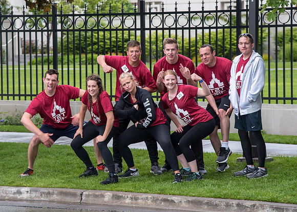 After braving the unpredictable Idaho weather in June, teams celebrate crossing the finish line near the Idaho Falls Temple in the annual temple to temple relay race.