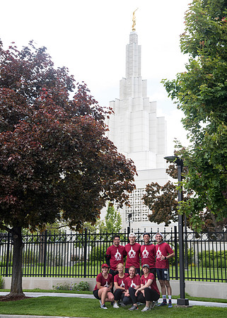 After braving the unpredictable Idaho weather in June, teams celebrate crossing the finish line near the Idaho Falls Temple in the annual temple to temple relay race.