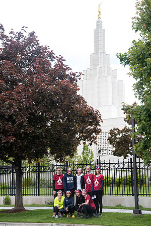 After braving the unpredictable Idaho weather in June, teams celebrate crossing the finish line near the Idaho Falls Temple in the annual temple to temple relay race.