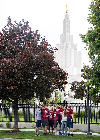 After braving the unpredictable Idaho weather in June, teams celebrate crossing the finish line near the Idaho Falls Temple in the annual temple to temple relay race.