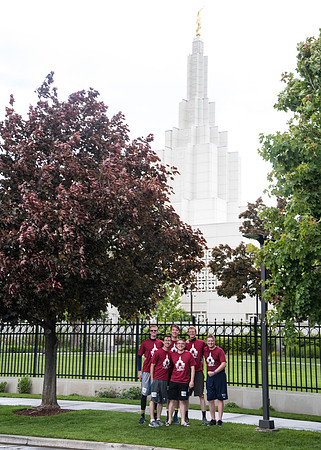 After braving the unpredictable Idaho weather in June, teams celebrate crossing the finish line near the Idaho Falls Temple in the annual temple to temple relay race.