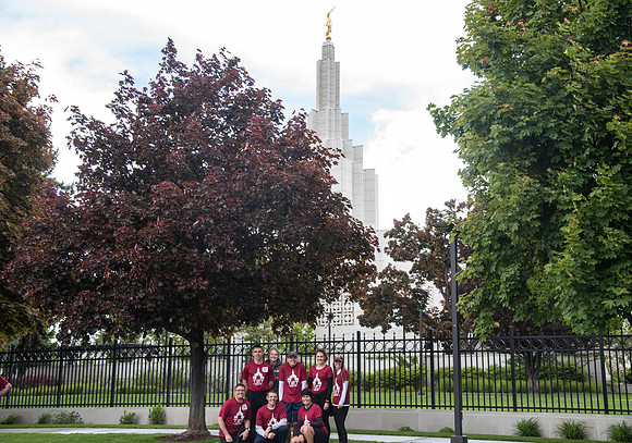 After braving the unpredictable Idaho weather in June, teams celebrate crossing the finish line near the Idaho Falls Temple in the annual temple to temple relay race.