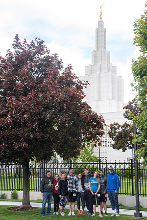 After braving the unpredictable Idaho weather in June, teams celebrate crossing the finish line near the Idaho Falls Temple in the annual temple to temple relay race.