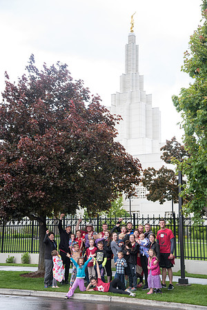 After braving the unpredictable Idaho weather in June, teams celebrate crossing the finish line near the Idaho Falls Temple in the annual temple to temple relay race.
