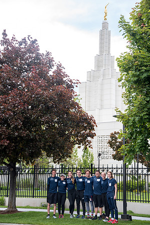After braving the unpredictable Idaho weather in June, teams celebrate crossing the finish line near the Idaho Falls Temple in the annual temple to temple relay race.